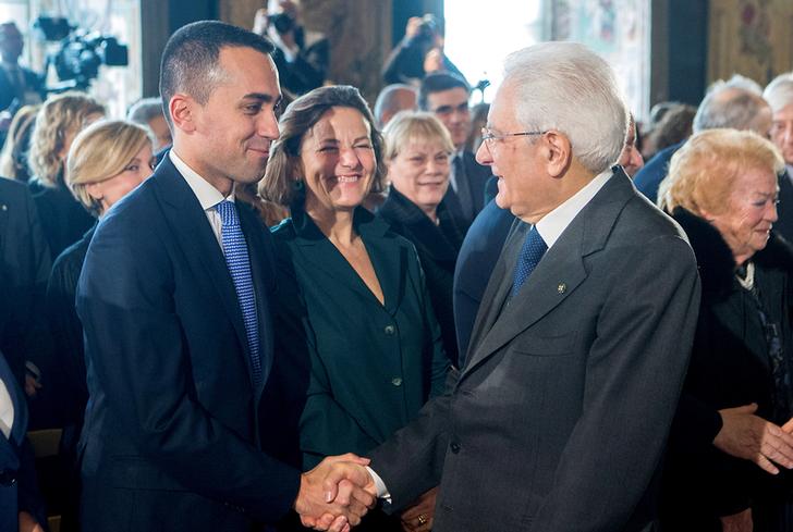 Il leader del Movimento 5 stelle stringe la mano al presidente della Repubblica Sergio Mattarella. Reuters